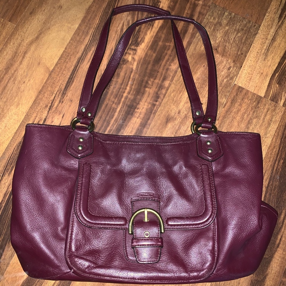 Purple coach leather handbag